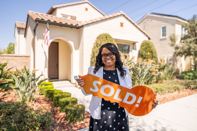 bedroom office with blue accent wall and desk